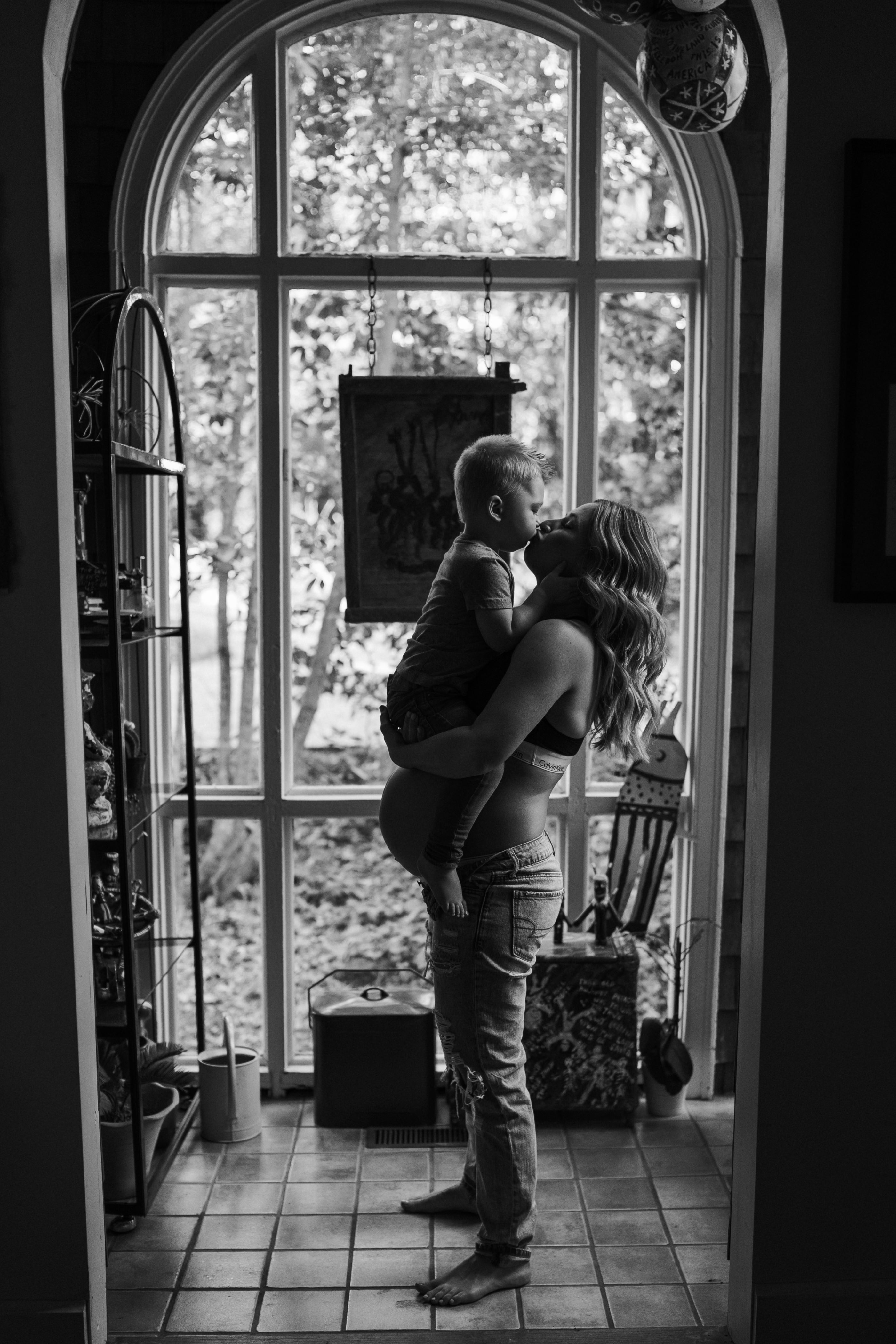 Intimate in-home maternity photography, mom and toddler