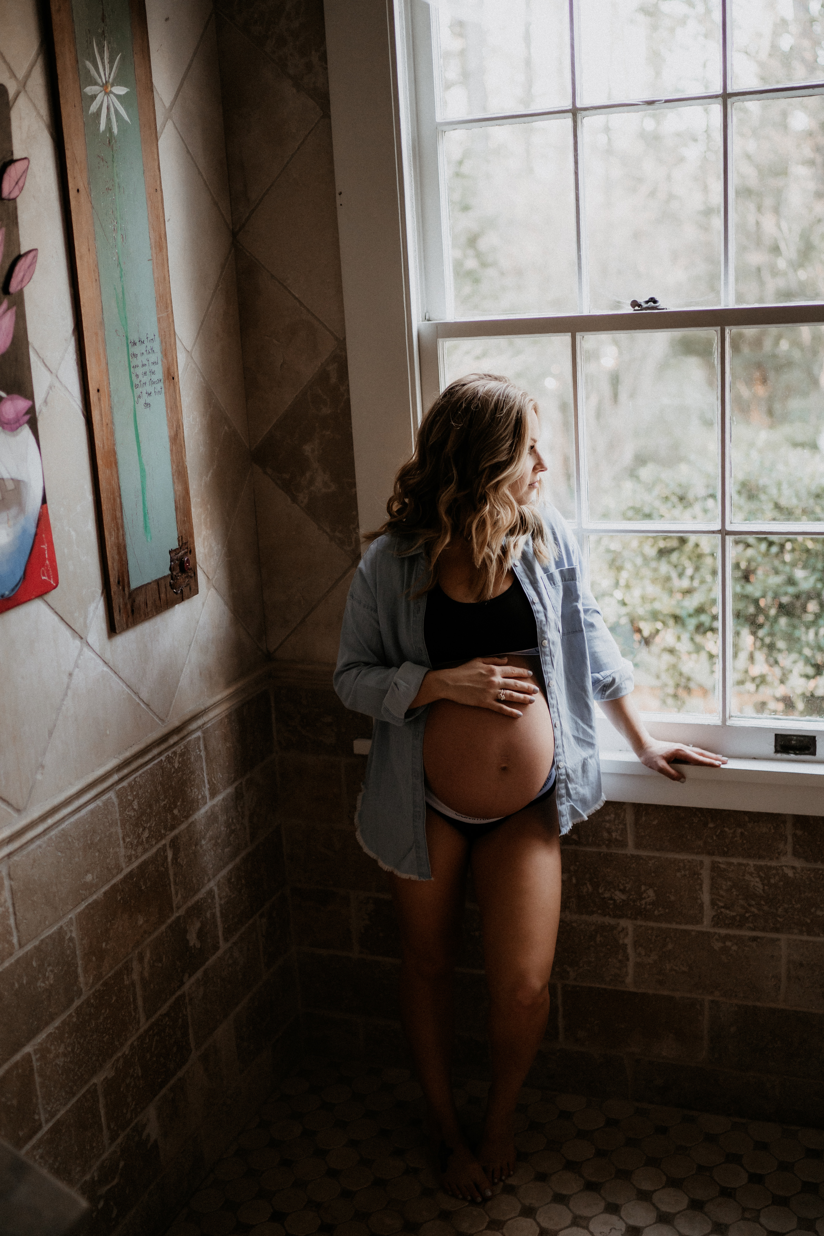 Intimate in-home maternity photography, pregnant mama near window